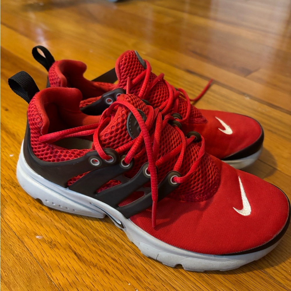 Nike Red and Black Sneakers with Mesh Construction